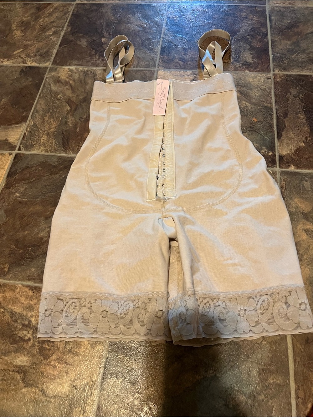 Brand-new shapewear with tags attached. Valued at $80.